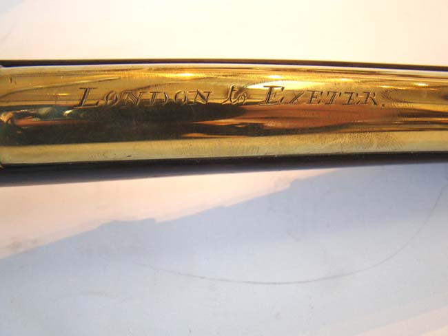 A pair of English flintlock brass barreled coaching pistols by John Bennett circa 1790 — image 7